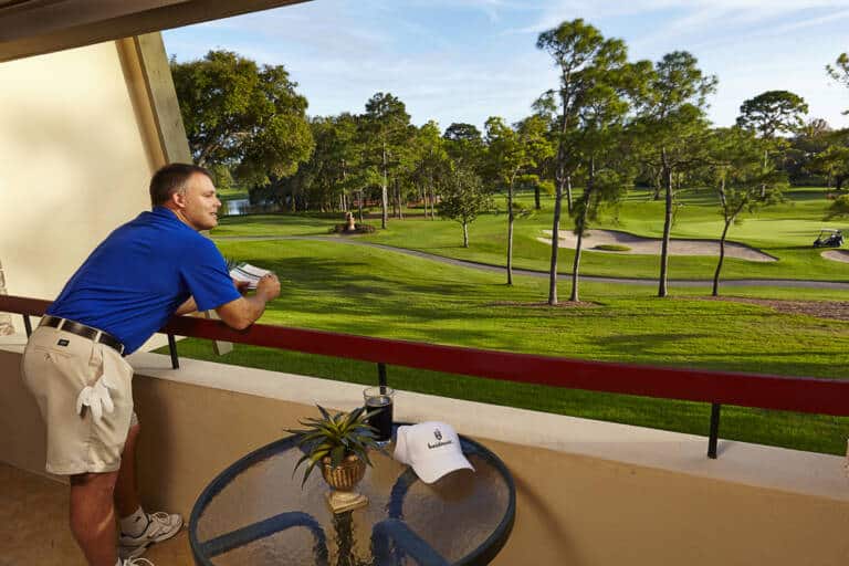 Golfer on balcony0896